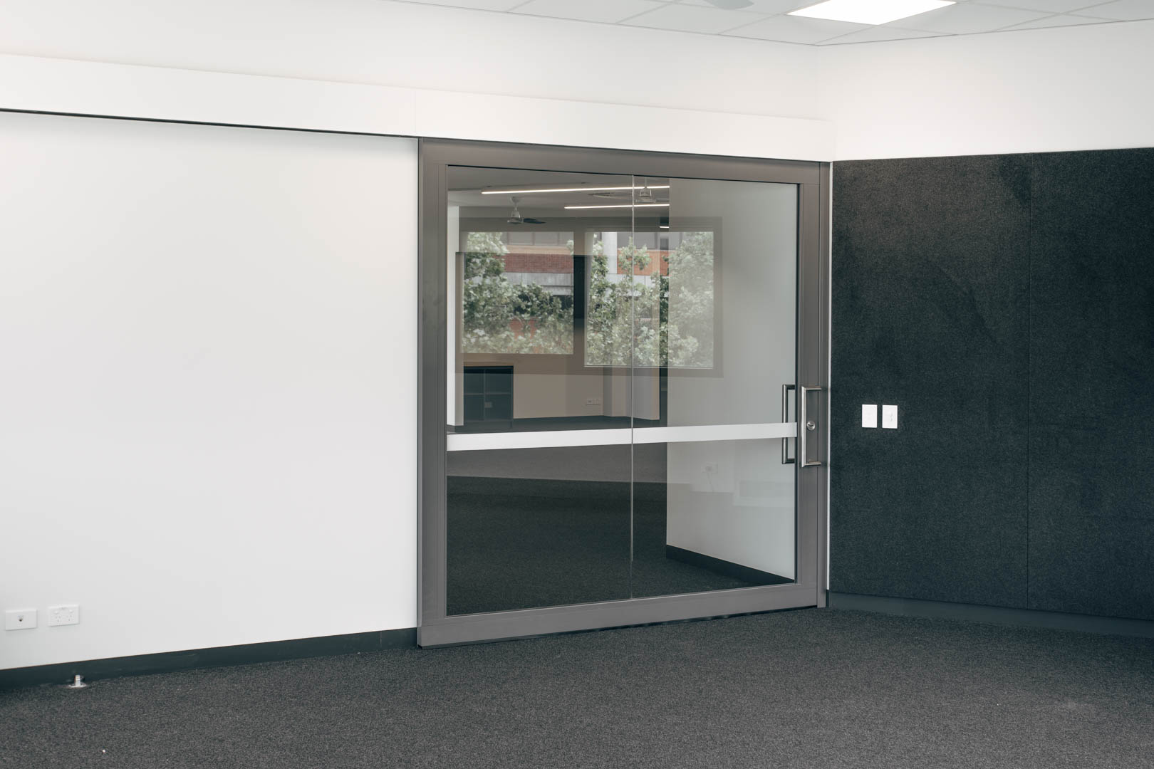 image of an acoustic sliding door system in education setting