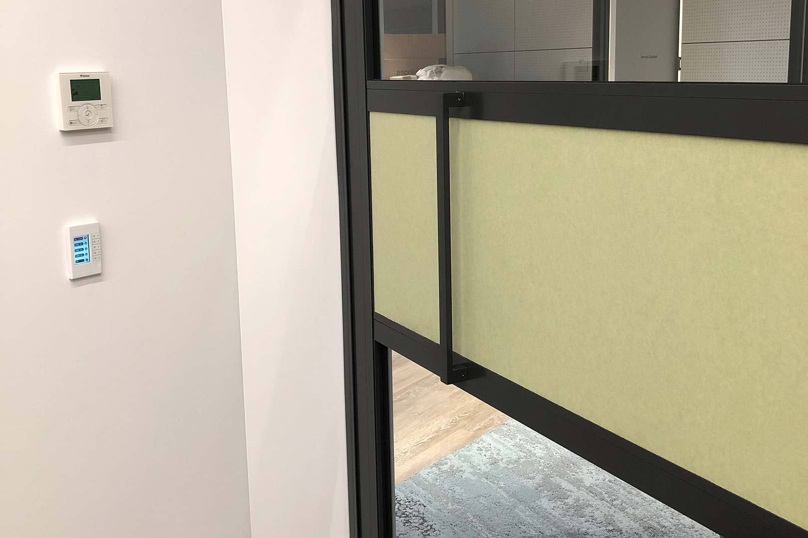 image of the handle on a GLYDE acoustic sliding door system