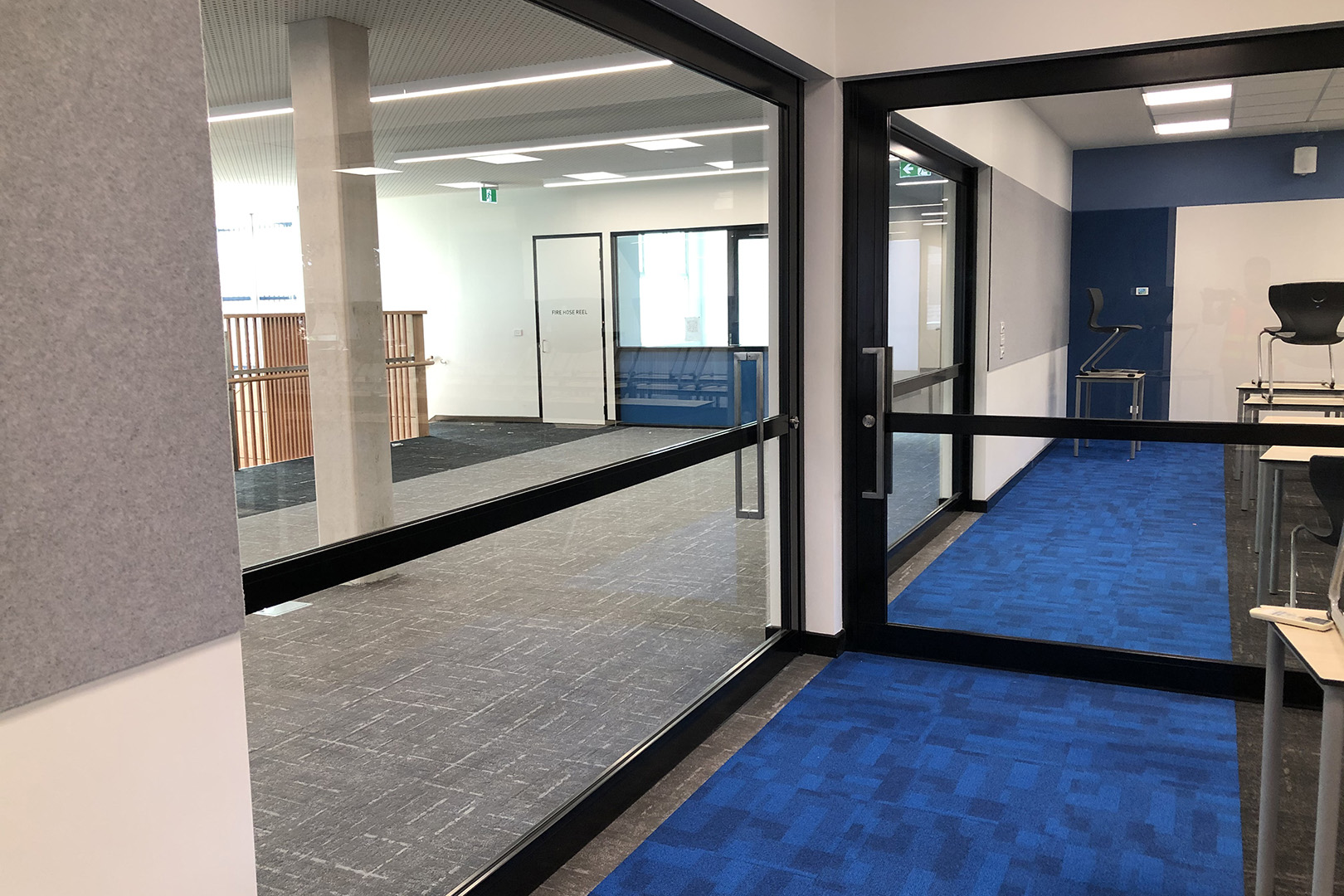 image of acoustic sliding doors inside a secondary school