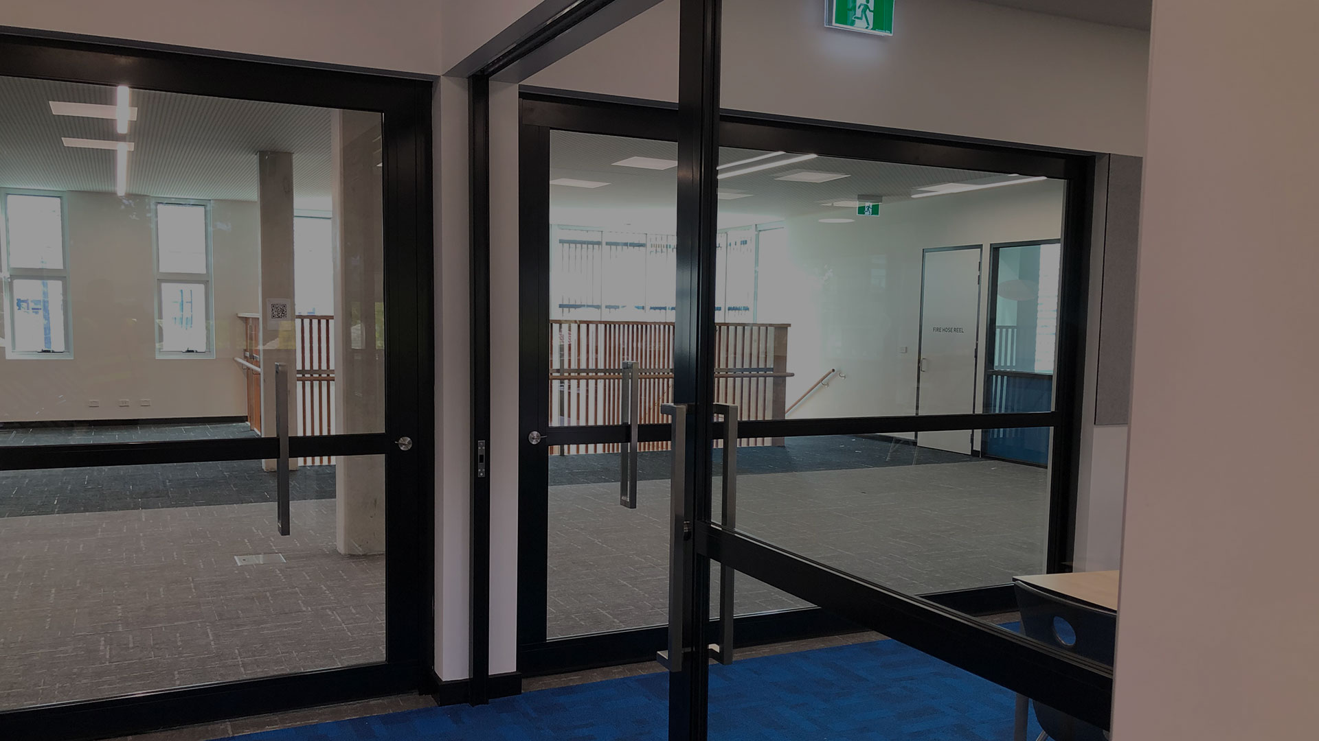 image of GLYDE acoustic sliding doors installed in a school