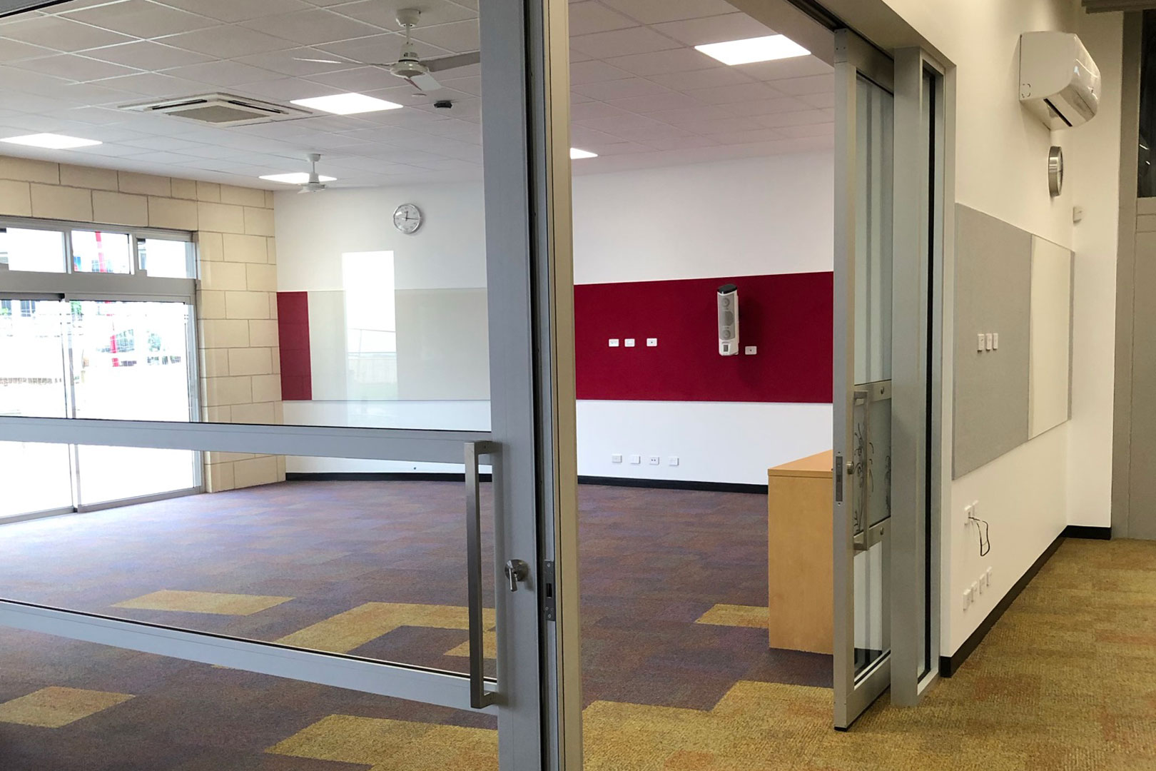 general learning area in school with acoustic glazed sliding doors