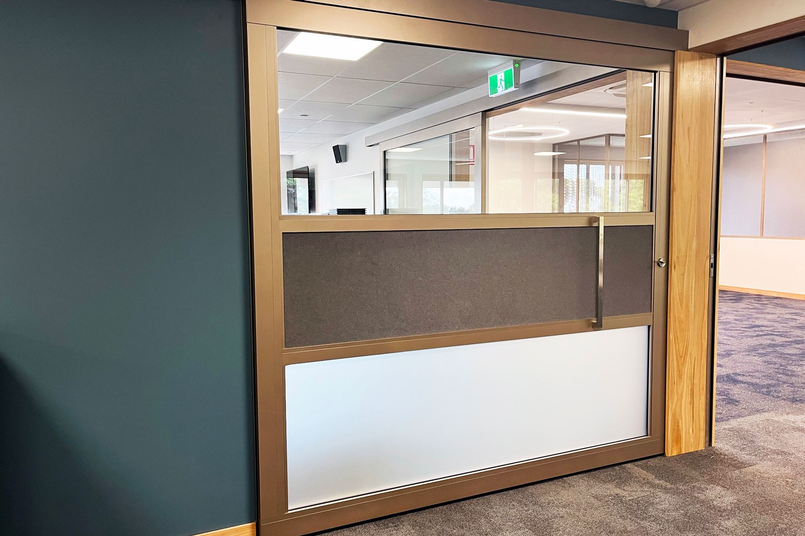 Acoustic sliding doors with recessed receiving jambs in the classroom