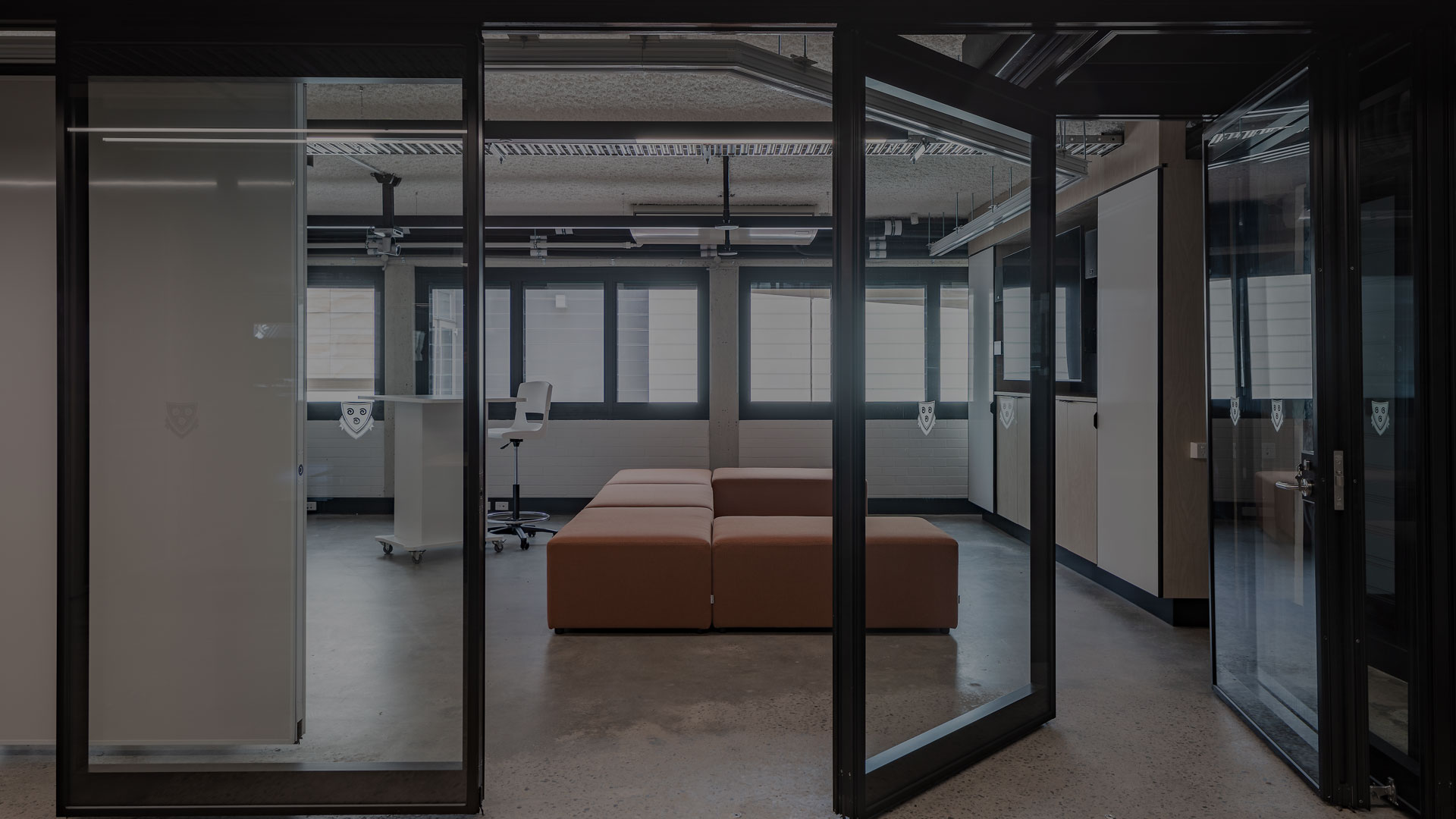 Optica glazed operable wall system with panel open