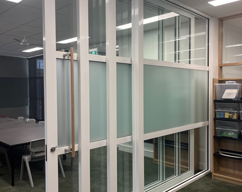sliding wall system with glazed and frosted panels