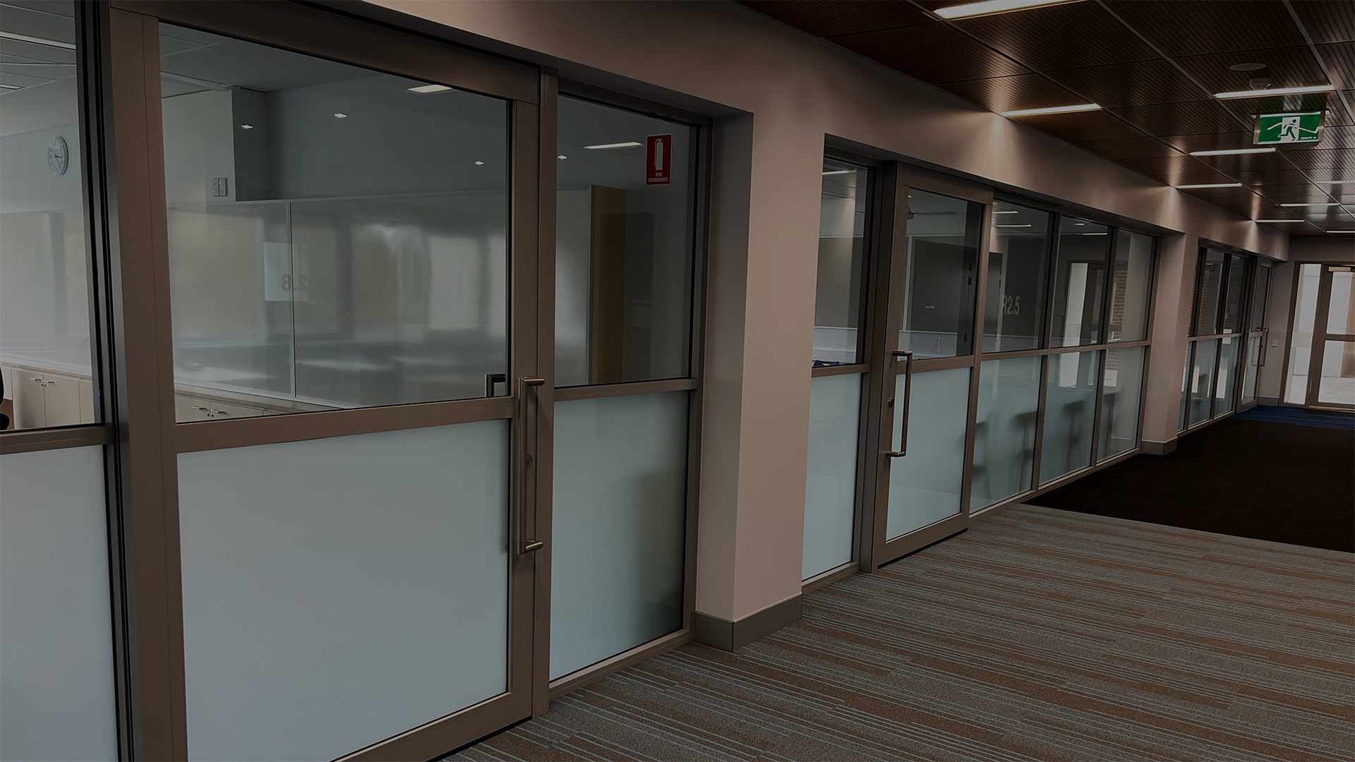 glazed acoustic sliders installed in a school