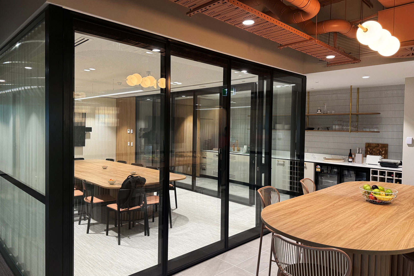 Optica glazed operable wall for office fitout space