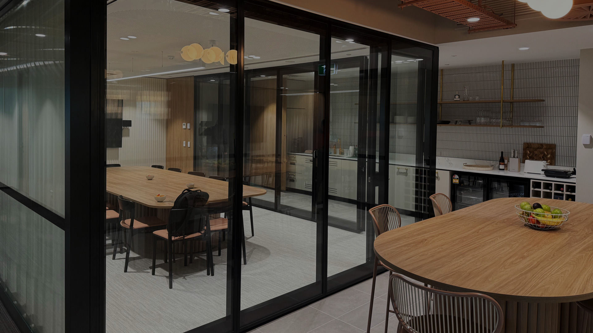 Optica glazed operable wall for office fitout space