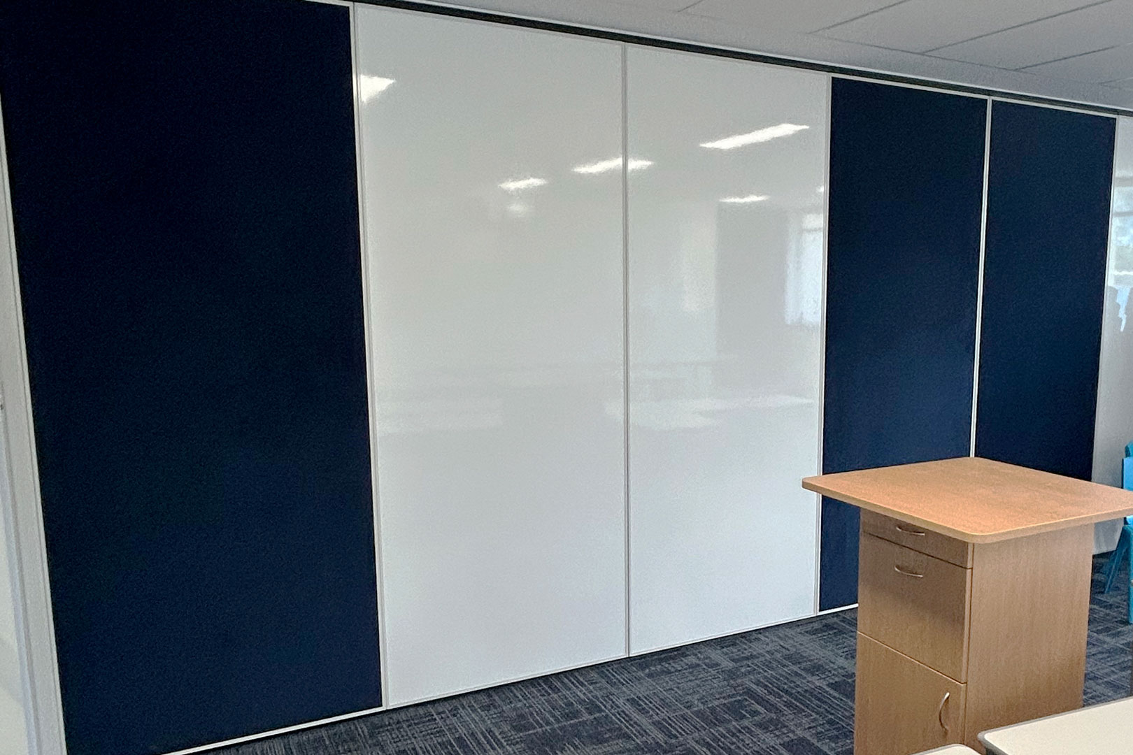 Optica acoustic solid operable wall with whiteboards for flexible learning spaces