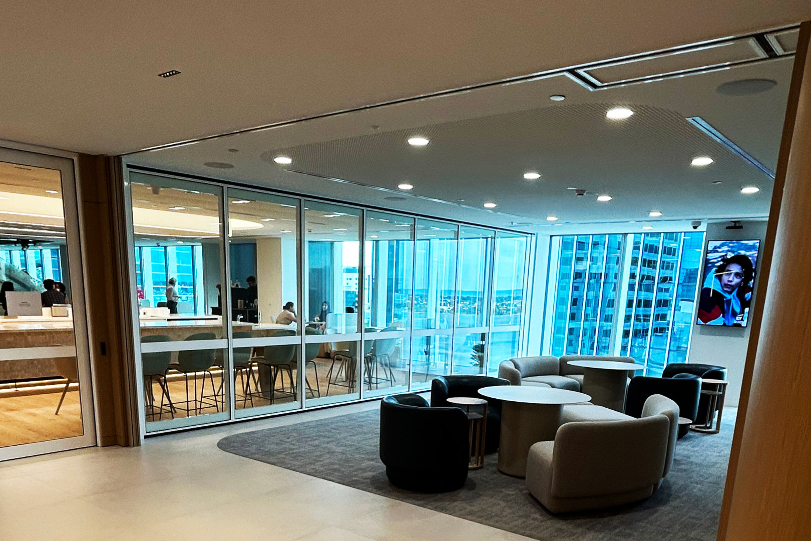 Remote stack glazed operable wall for commercial fitout