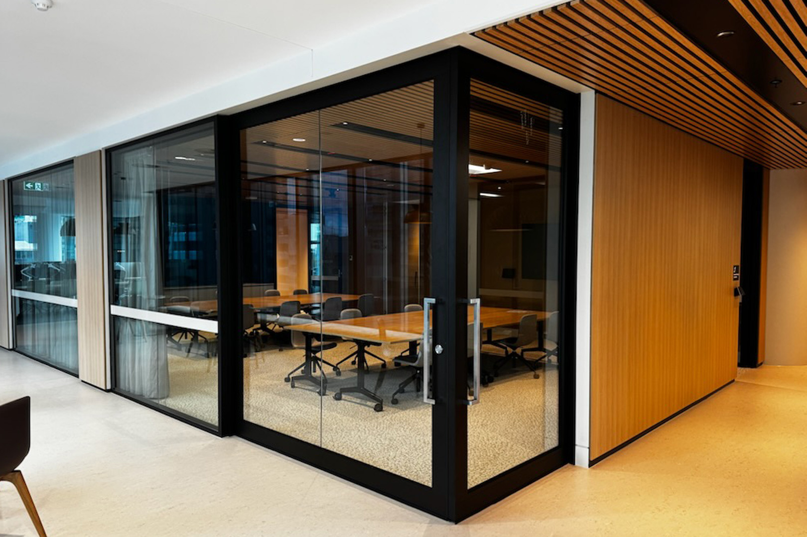 Rw37 rated 90 degree junction acoustic slider for commercial fitout