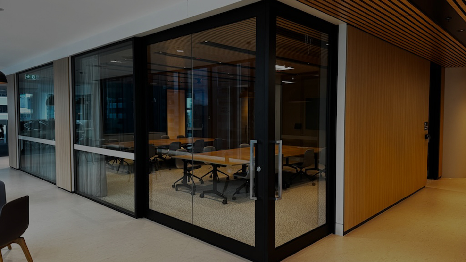 Rw37 rated bi-parting acoustic slider for commercial fitout