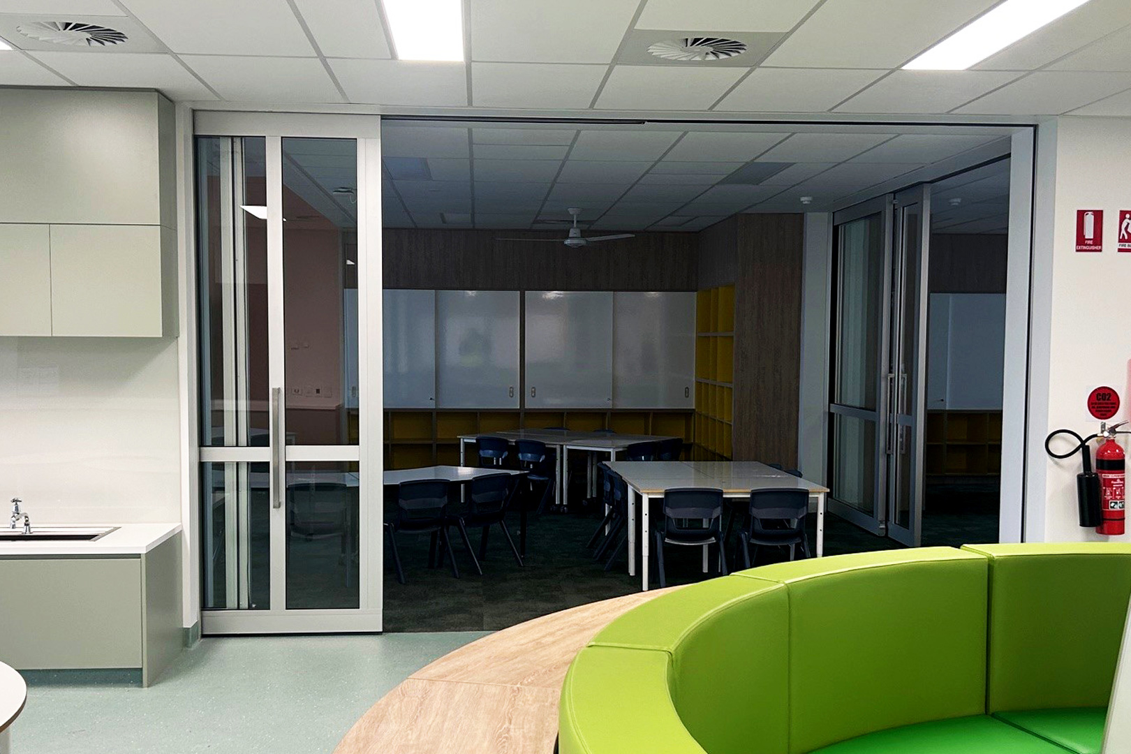 Glass acoustic sliders installed in a school