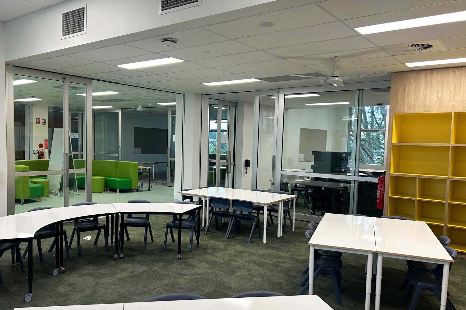 dual acoustic glazed sliders installed in a school