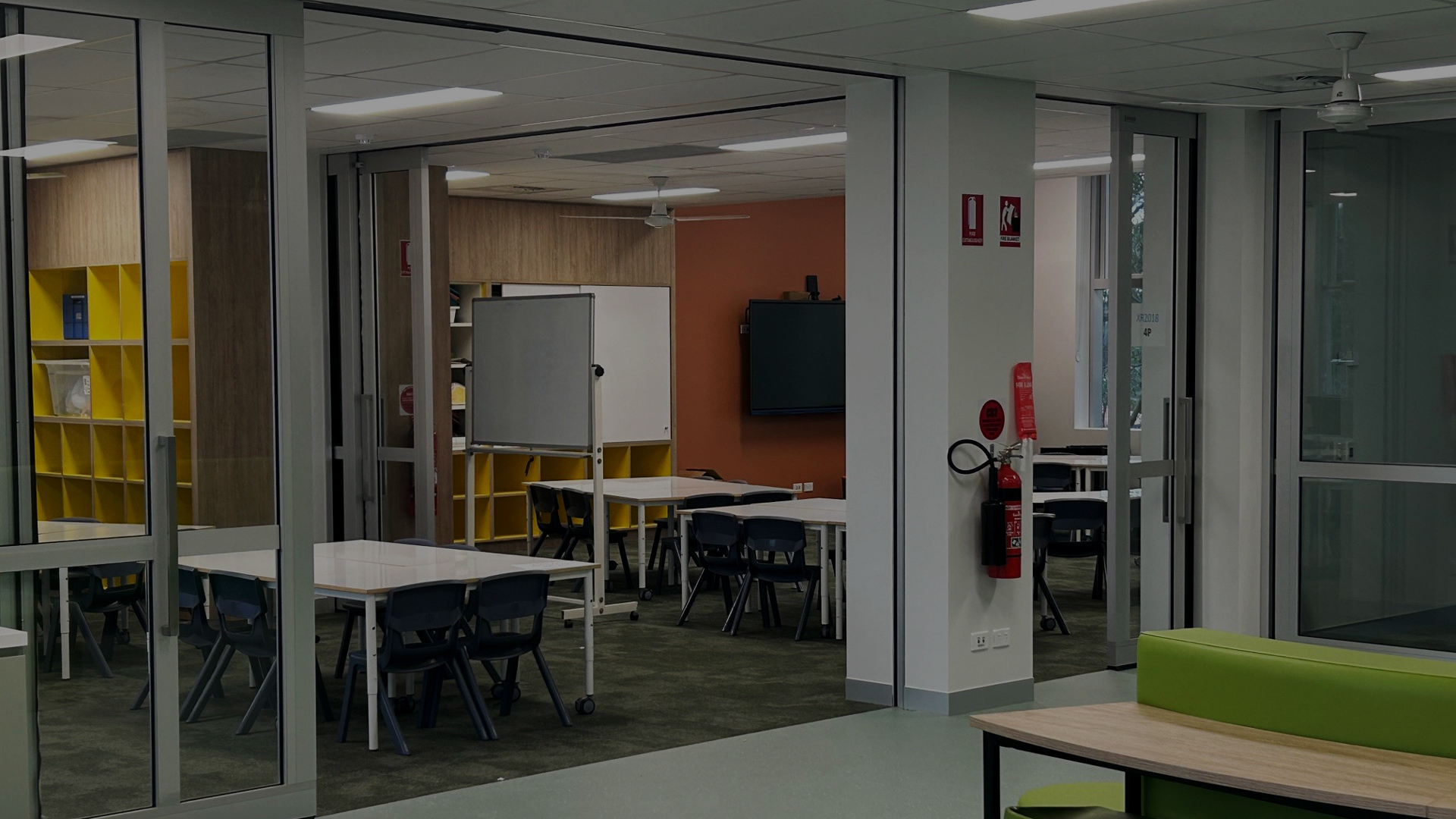 dual acoustic glazed sliders installed in a school