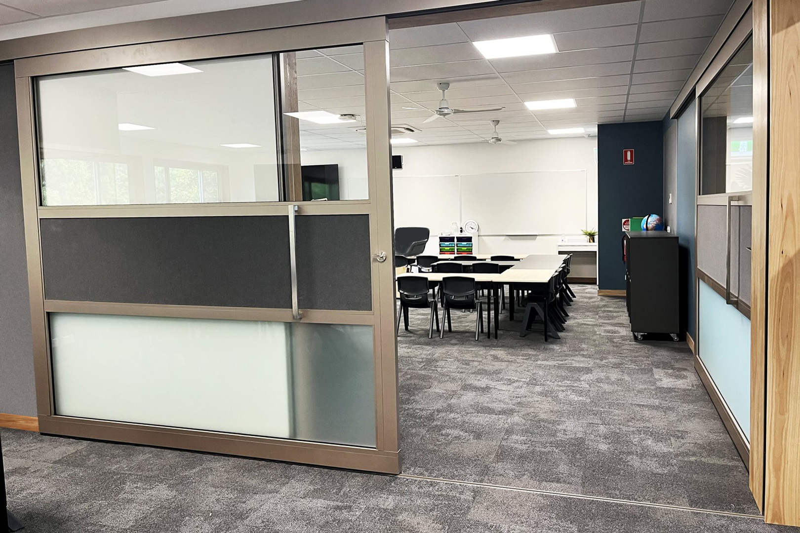 bottom rolling acoustic sliding door system