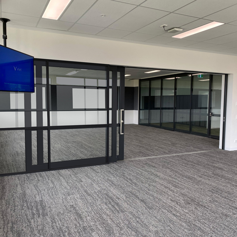 bottom rolling acoustic sliding door system