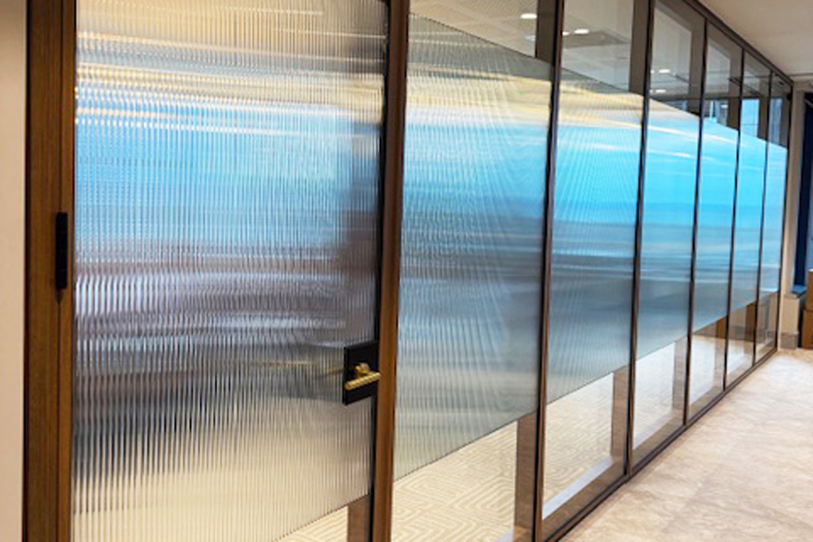 Optica glazed acoustic operable wall